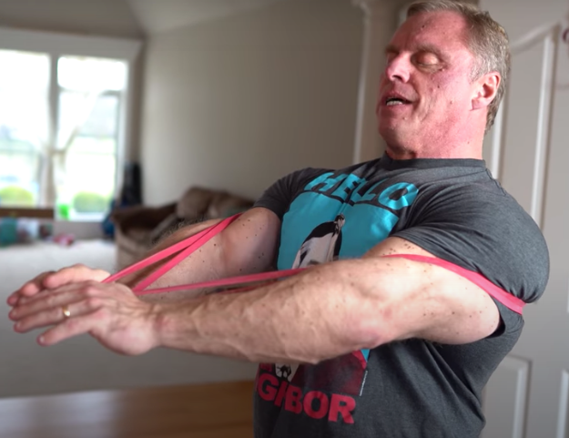 using the mini band for a chest press